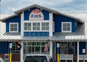 Shucker’s G’town OUT, Fins IN
